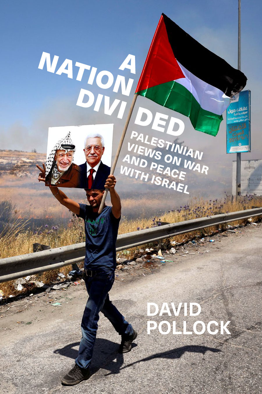 Book cover showing a man holding a Palestinian flag and a photo
