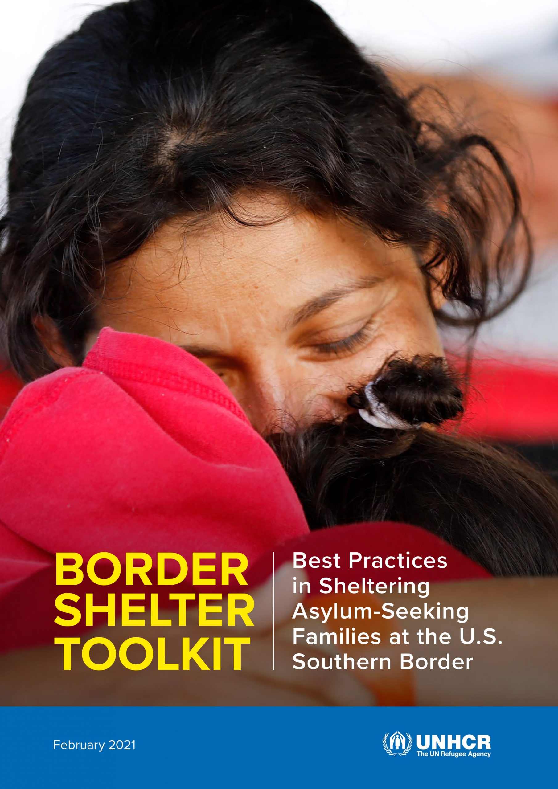 Toolkit cover showing woman hugging child